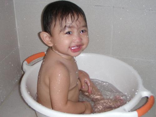Pure Joy - A happiness derives from simple things, a pure joy only experience by a pure heart. a heart that appreciates, a heart that knows how to be contented, a heart that is willing to be filled in with simple things (a basin and a water, a heart that knows how to be happy in little things