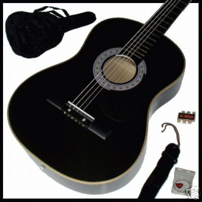 black acoustic guitar - a nice black acoustic guitar with a strap,tuner,case and a plectrum.