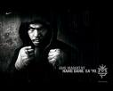 Manny Pacquio - photo great boxer Manny Pacquiao wearing his boxing robes in black backdrop.