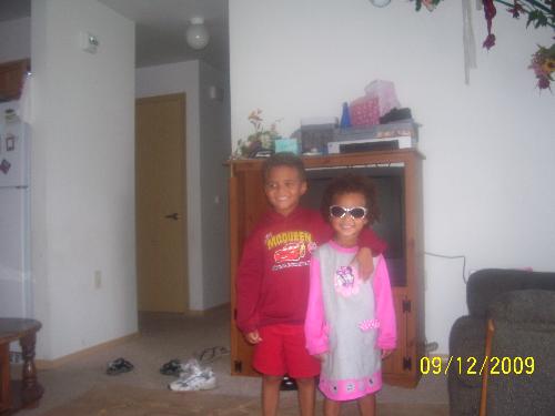 My kids, age almost 5 and 2 1/2 - My 2 older kids, posing for the camera and actually getting along! :) Taken about 3 weeks before the older one's 5th birthday.