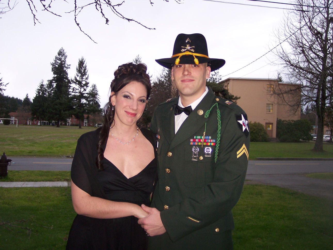 me and the hubby - My handsome husband and I getting ready to go to the ball. Be impressed because I dont dress up that often!!