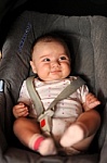 Baby seat - This is the image of the baby seating in the chair.