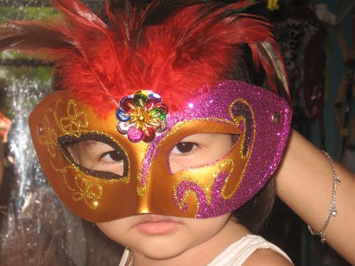 LEEYAM in a mascarra - this was taken in grandma's house.we were just photoshooting together with mom and aunts.i used a butterfly mask.
