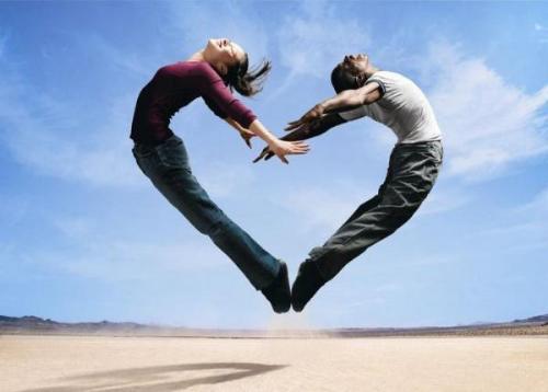 Jump for Love - A couple jump creating the heart shape.