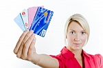 Credit cards - This is the photo of the women holding credit cards
