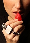 Women eating strawberry - This is the photo of the women eating strawberry.