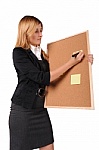 Women writing on board - This is the photo of the women writing on pinboard