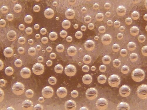 Bubbles - Close-up photo of bubbles in a botle.