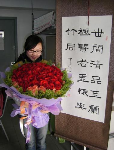 my calligraphy - This is written by myself and this script is called Li Script(Official Script). This was the gift I gave the father of my boyfriend when we(I and his father) was at the first meeting. Can you guess what does the script mean?  But do not misunderstanding, the rose is mine. My boyfriend gave me. O(n_n)O