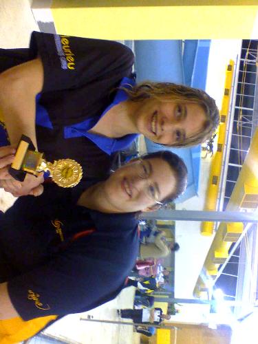 swimming medal - Here is a photo of my daughter getting a swimming medal. She is the one on the left.