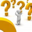 confused man with question - tHIS is the photo of the confused man with lots of question around him