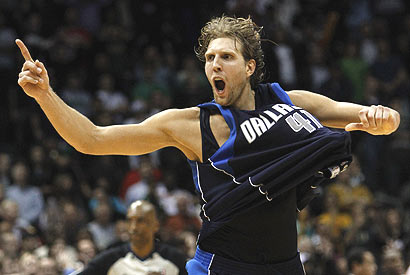 Dirk Celebrating - Dirk Nowitzki's patented celebration move. It's called untuck a jersey move! He won the game!