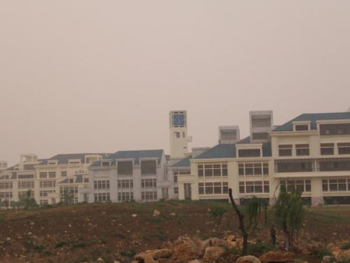 building - a building of school of economic,seeing at a distance,a block hanged up