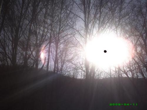 dark sun - digital photo with black sun...easter sudnay 2009