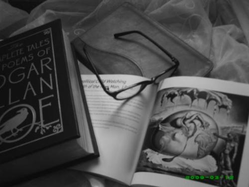 Poe Reading - still life of the art of reading and knowledge