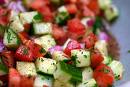 Israeli Salad - this is the photo of the israeli salad. I used to live on this salad. The core receipes are half a red onion , two tomatoes , one pound english cuke , lemon juice , olive oil , parsley ,salt , pepper , sumac powder.