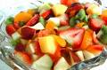 Fruit Salad - This is the image of the fruit salad.The ingredients are fresh cherries , pineapple , orange , honeydew melon , almond sliceS. For dressing we need yogurt , orange juice ,lemon juice ,mayonnaise , sugar , peel