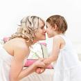 Mom - This is the photo of the mother kissing her kid