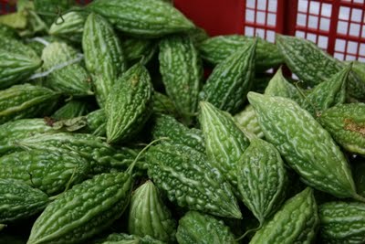 Bitter Gourd - It is a green Bitter Gourd.An excellent hybrid variety of Bitter Gourd.
