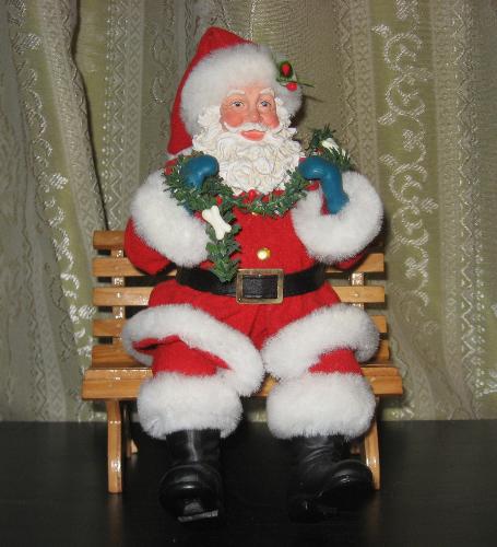 Santa  - Santa and his perch on my living room stand.