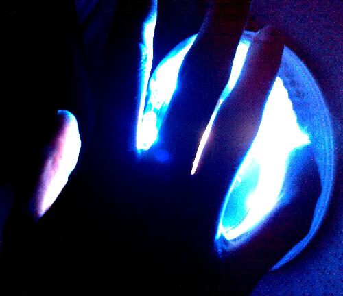 hand in light - The hand touching the light