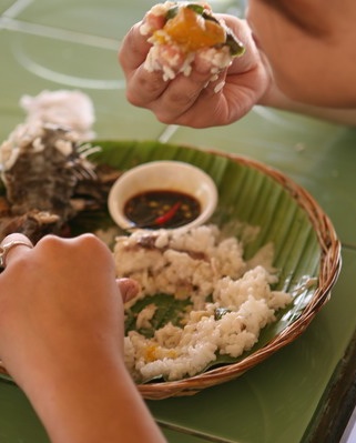 Let's eat! - Proper way of eating using hands: Wash your hands first (for sanitary purposes). Using the tips of your five fingers, pool the rice (and viand: fish, meat or vegetable) in one mound and pick it all up. Not one tiny piece of food should reach the inner palm. Put your hands close to your mouth and with the use of your thumb push the food inside your mouth.