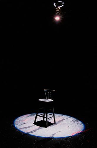 spotlight - a chair is in the spotlight