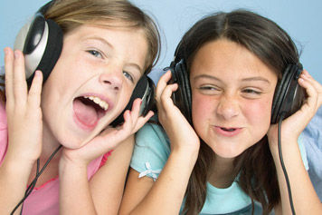 siblings enjoy music - cut siblings enjoy music photo