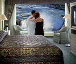 newly wed couple  - honeymoon in a resort hotel room