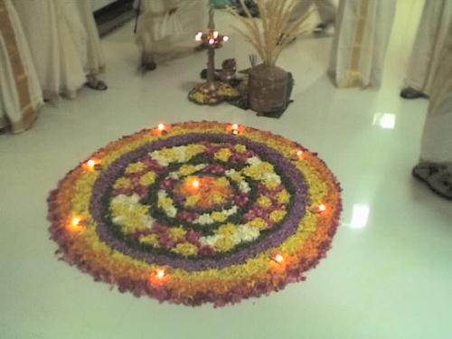 Attham, floral arrangment -  This is a kind of floral arrangement here at my place. We use to make these kind of arrangements for our festival called 'Onam'