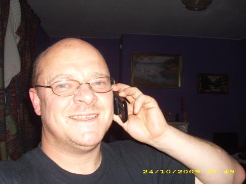 me happy for a change - me on phone looking as if i won the lottery