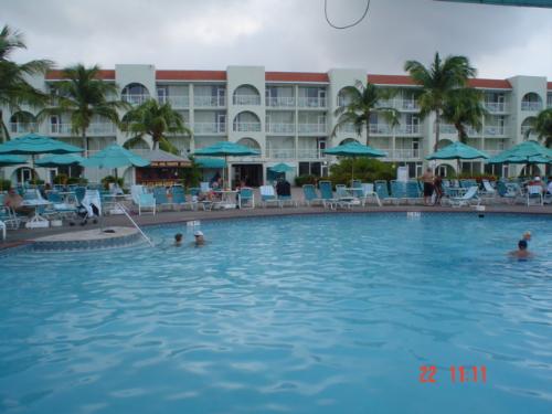 Vacations in Aruba - An awesome day by the pool in Aruba. I take a sandwich, a book and something to drink. Wonderful!