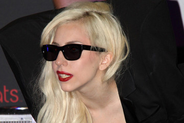 shoulders - lady gaga in fashion for a cd signing