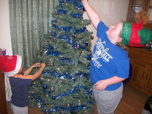 My Helpers - My Children/Helpers decorating our Christmas tree
