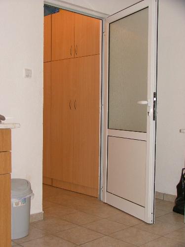 Wardrobe in corridor - The apartment was a big mess and live out of a suitcase untill l bought the wardrobe