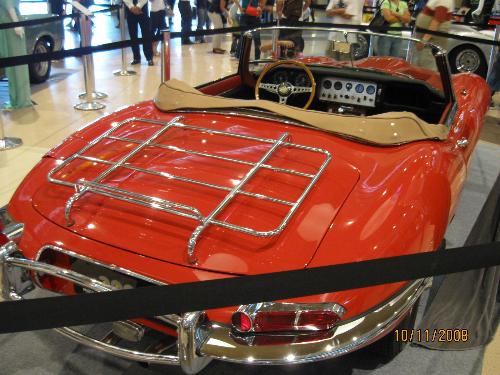 red car  - red car seen at a vintage show at a mall