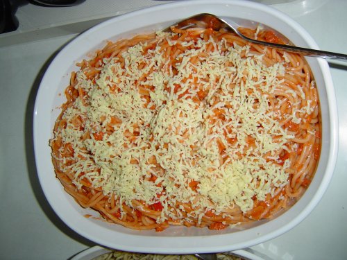 Spaghetti - Spaghetti topped with cheese.