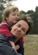Son - this is the photo of the father and son playing happily in a ground