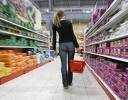 shop in provisions - this is the photo of the women who is doing her shopping in a provisional super market.