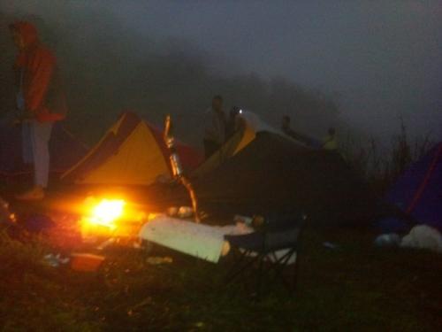 campfire - climbers making fire to warm themselves for the night