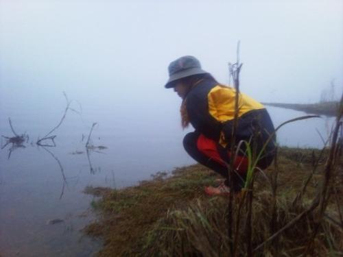 enjoying nature - enjoying lake seen during mountain climbing