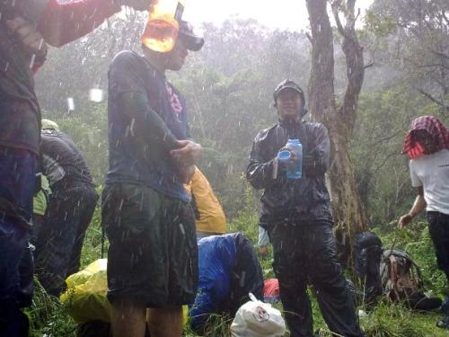 enjoying rain - enjoying rain during mountain climbing