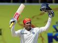 shewag - typical shewag, when he scored a century, he raises his bat to his team mates and to the audience