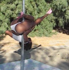 me pole dancing - me pole dancing hanging on with the inside of one thigh