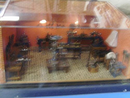 Miniature workshop - Well this is made of clay of course but it is a small scale model of the real workshop that used to be here when the facility was a factory for trains.