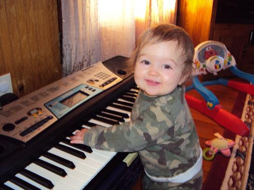 Kylie Ann (10 months) - Kylie 'playing' the keyboard. :)