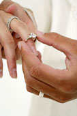 Engagement/wedding - Here is a couple in the process of saying 'I do'