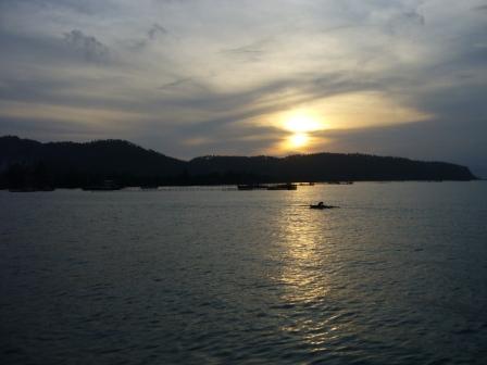 Sunset at Glan, South Cotabato - This mesmerizing sunset was taken when I was in Glan, South Cotabato. I was at the pier. That part of the island in the picture is a place called Kalunasan, where a very beautiful beach with fresh waters facing the ocean can be found.