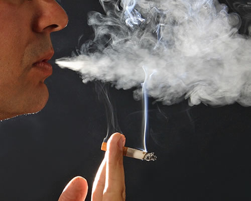 Smoking - Smoking during a hot season.