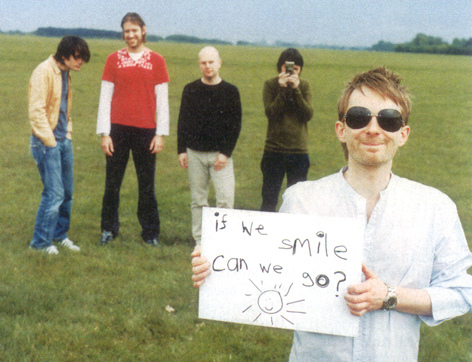Childish Radio-guys - Radiohead doin' some fun about their 'need' of photo promos. Really a childish thing, like 'if I smile, can i go home, daddy??' And fun to. xD